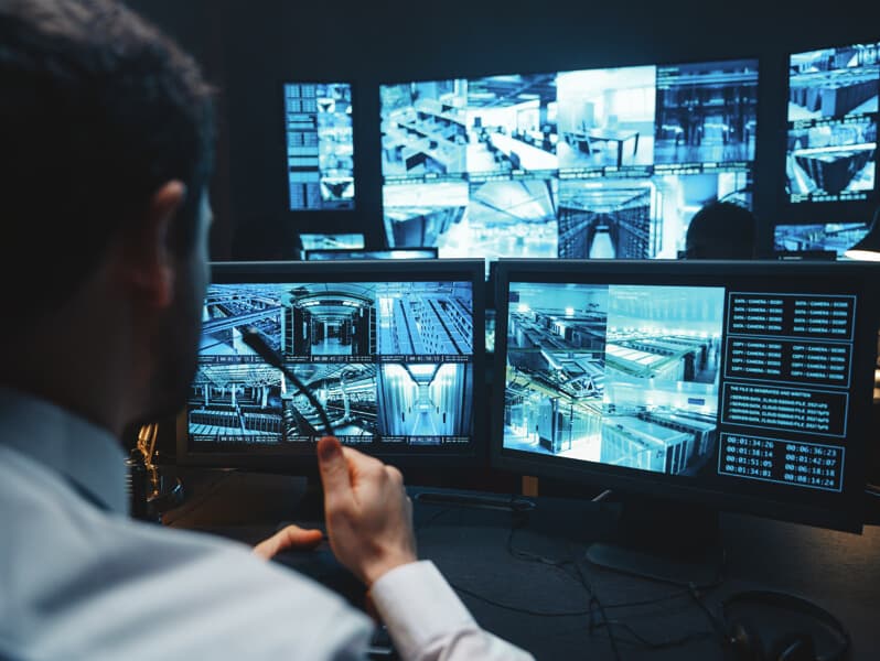GSOC analyst monitoring multiple screens